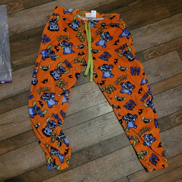 Disney Orange and Black Pajama Pants Stitch Med - Picture 1 of 4